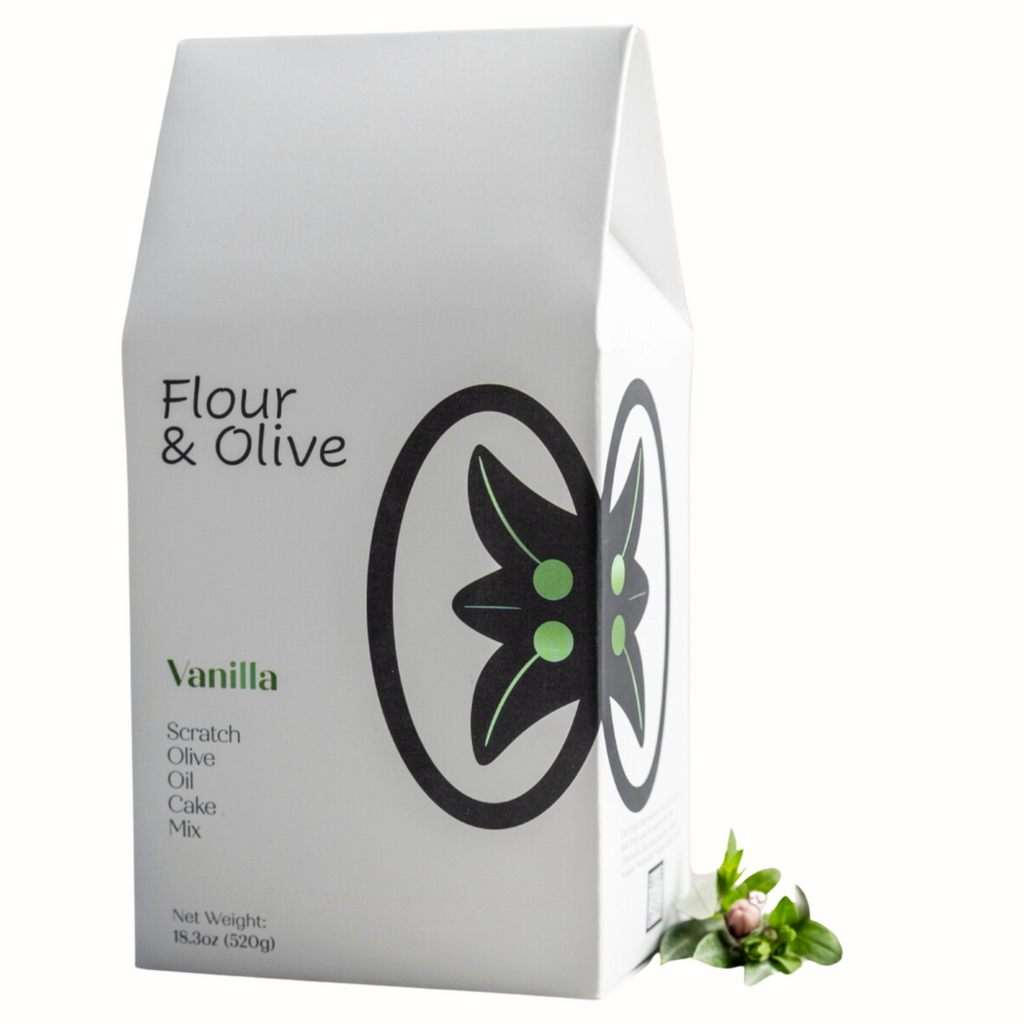 A packaged box of Flour & Olive Vanilla Cake Mix with a graphic of a vanilla bean and leaves on the front.